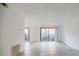 Living room with sliding glass doors and patio access at 3318 Northcrest Rd # D, Atlanta, GA 30340