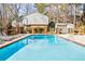 Refreshing community pool with plenty of lounge chairs at 3318 Northcrest Rd # D, Atlanta, GA 30340