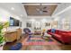 Living room with hardwood floors, vaulted ceiling, and comfortable seating at 719 Courtenay Ne Dr, Atlanta, GA 30306