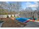 Backyard oasis with a covered inground pool and spacious patio at 2885 Field Spring Dr, Lithonia, GA 30058