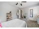 Spacious bedroom with a queen bed, mirror, and plenty of storage at 2885 Field Spring Dr, Lithonia, GA 30058
