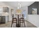 Kitchen breakfast nook with a small table and two chairs, and access to backyard at 2885 Field Spring Dr, Lithonia, GA 30058