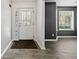 Bright entryway with tile flooring and a decorative glass door at 2885 Field Spring Dr, Lithonia, GA 30058