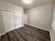 Bright bedroom with hardwood floors and double door closet at 3030 Parkland Vw, Atlanta, GA 30331