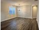 Bright dining room featuring hardwood floors and a chandelier at 3030 Parkland Vw, Atlanta, GA 30331