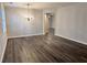 Spacious dining room with hardwood floors and a chandelier at 3030 Parkland Vw, Atlanta, GA 30331