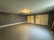 Two car garage with concrete floor and painted walls at 5409 Mill Valley Dr, Douglasville, GA 30135