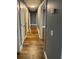 Hallway with multiple doors leading to other rooms in the house at 5409 Mill Valley Dr, Douglasville, GA 30135