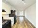 Well-lit kitchen with stainless steel appliances and hardwood floors at 5409 Mill Valley Dr, Douglasville, GA 30135