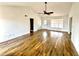 Bright living room with wood floors, ceiling fan, and lots of natural light at 5409 Mill Valley Dr, Douglasville, GA 30135