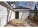 Wooden back deck with an entrance to the house at 1449 Athens Sw Ave, Atlanta, GA 30310