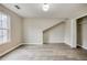 Bright bedroom featuring hardwood floors, a window, and closet at 1449 Athens Sw Ave, Atlanta, GA 30310