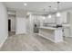 Modern kitchen features stainless steel appliances, a center island, and sleek gray cabinetry at 1449 Athens Sw Ave, Atlanta, GA 30310
