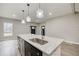 Open-concept kitchen with stainless steel appliances, granite countertops, and ample natural light at 1449 Athens Sw Ave, Atlanta, GA 30310