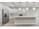 Modern kitchen with a granite counter, stainless steel appliances, and white cabinetry at 1449 Athens Sw Ave, Atlanta, GA 30310
