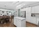 Spacious kitchen with island, stainless steel appliances, and white cabinets at 4780 Rambling Rose Dr, Cumming, GA 30040