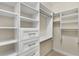 Spacious walk-in closet with custom shelving and ample storage space at 3280 Stillhouse Se Ln # 305, Atlanta, GA 30339