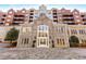 Brick and stone exterior of The Greystone condominium building at 3280 Stillhouse Se Ln # 305, Atlanta, GA 30339