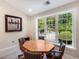 Cozy game room featuring a classic game table, an artistic picture, and natural light at 3280 Stillhouse Se Ln # 305, Atlanta, GA 30339