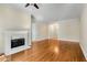 Bright living room featuring hardwood floors and a fireplace at 3280 Stillhouse Se Ln # 305, Atlanta, GA 30339