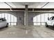 Reserved parking spots in a well-lit garage with concrete pillars and clearly marked spaces at 3280 Stillhouse Se Ln # 305, Atlanta, GA 30339