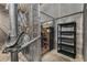 Chain link fenced storage unit with shelving, providing secure storage for belongings at 3280 Stillhouse Se Ln # 305, Atlanta, GA 30339