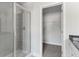 Bathroom with glass shower and walk-in closet at 490 Paces Dr, Lithia Springs, GA 30122