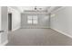 Spacious bedroom with carpeted floor and ceiling fan at 490 Paces Dr, Lithia Springs, GA 30122
