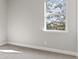 Bright bedroom with neutral walls and carpet flooring at 490 Paces Dr, Lithia Springs, GA 30122