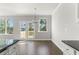 Bright dining area with hardwood floors and access to deck at 490 Paces Dr, Lithia Springs, GA 30122