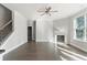 Living room features hardwood floors, fireplace, and lots of natural light at 490 Paces Dr, Lithia Springs, GA 30122
