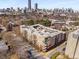 Aerial view of a modern apartment building in a vibrant city setting at 384 Ralph Mcgill Ne Blvd # 404, Atlanta, GA 30312