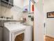 Convenient laundry area with washer, dryer, and shelving at 384 Ralph Mcgill Ne Blvd # 404, Atlanta, GA 30312