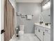 Clean bathroom with a shower/tub combo, white vanity, and gray walls at 1072 Brookglynn Trce, Decatur, GA 30032