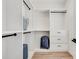 Walk in closet with hanging rods, shelves and drawers at 1072 Brookglynn Trce, Decatur, GA 30032