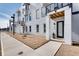 Modern townhouse exterior with brick facade, black accents and minimal landscaping at 1072 Brookglynn Trce, Decatur, GA 30032