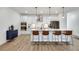 Modern kitchen with a large island, white cabinets, stainless steel appliances, and breakfast bar at 1072 Brookglynn Trce, Decatur, GA 30032
