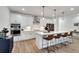 Modern kitchen with a large island, white cabinets, stainless steel appliances, and breakfast bar at 1072 Brookglynn Trce, Decatur, GA 30032