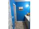 Bathroom features double vanity and bright blue walls at 11547 Hathaway Dr, Hampton, GA 30228