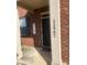 Close-up of the home's front door, column, welcome sign and house numbers at 11547 Hathaway Dr, Hampton, GA 30228