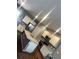 A bright kitchen with stainless steel appliances, granite counters, an island, and ample cabinet space at 11547 Hathaway Dr, Hampton, GA 30228