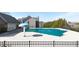 Community pool with safety cover at 4640 Hastings Ter, Alpharetta, GA 30005