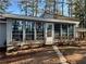 Bright sunroom addition with multiple windows at 582 Rebecca St, Lawrenceville, GA 30046