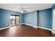 Bright bedroom with hardwood floors and balcony access at 1280 W Peachtree Nw St # 3306, Atlanta, GA 30309