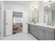 Bathroom view highlighting double vanity with marble countertops and modern fixtures at 396 Silverbell Way, Marietta, GA 30060
