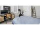 Cozy bedroom features modern decor, workout equipment and a dedicated workspace for ultimate comfort and convenience at 396 Silverbell Way, Marietta, GA 30060