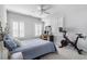 Bedroom with natural light, desk, workout bike, neutral walls and carpet at 396 Silverbell Way, Marietta, GA 30060