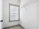 Walk-in closet featuring wire shelving and a window for natural light at 396 Silverbell Way, Marietta, GA 30060
