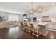 This gourmet kitchen features bar seating, and opens up to the living space with a fireplace at 396 Silverbell Way, Marietta, GA 30060