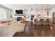 Living room and kitchen offers fireplace with a mantel and a kitchen island with barstool seating at 396 Silverbell Way, Marietta, GA 30060